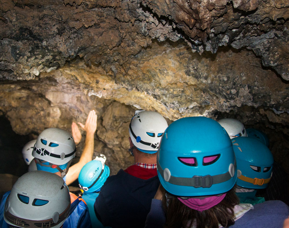 Visitors listen to the guide