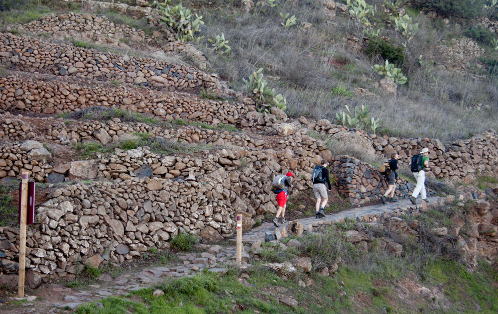 Hikers on the paved hiking trail near Chipude