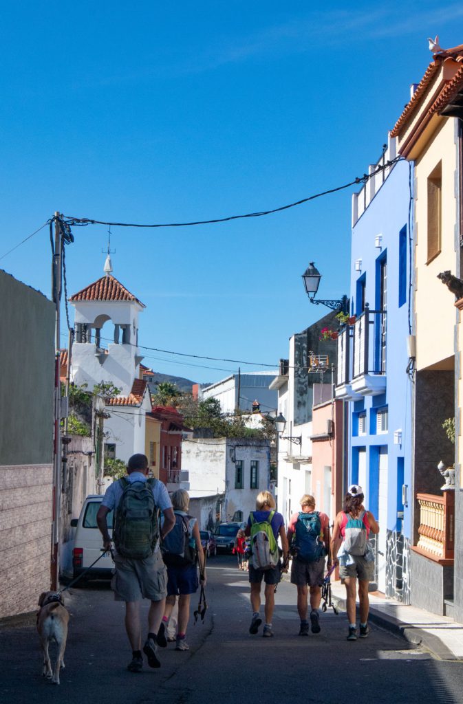 hikers in the village street of Genovés