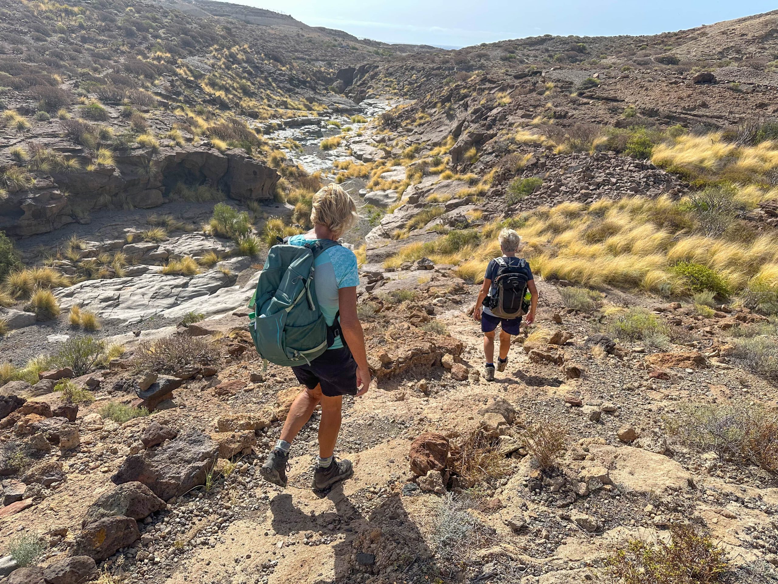 Hikers on the way from Arco de Tajao down to the coast